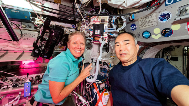 Astronauts on the International Space Station making a contact on Ham Radio